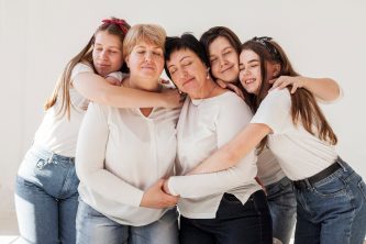 togetherness-group-of-women-hugging togetherness-group-of-women-hugging